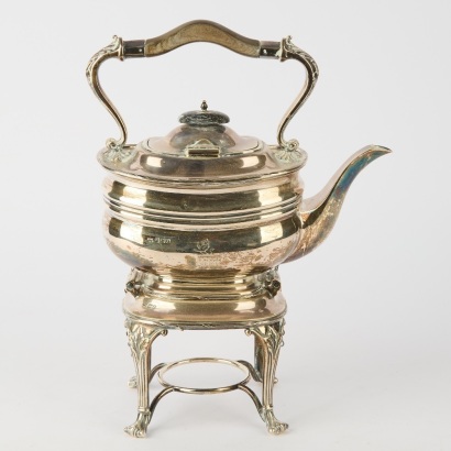 A Sterling Silver Teapot on Burner Stand