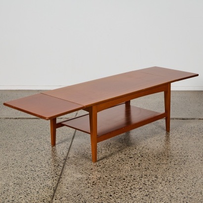 A Mid-Century Teak Drop Leaf Coffee Table
