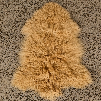 A Caramel Tibetan Lamb Hide Rug