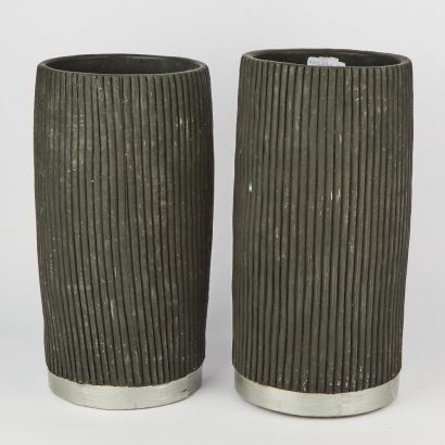A Set of Two Black Ceramic Planters