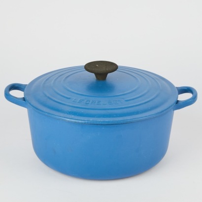 A Blue Le Creuset Casserole With Lid