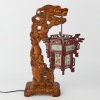 A Hand Carved Wooden Chinese Table Lamp