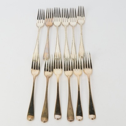 A Set of Twelve Sterling Silver Forks