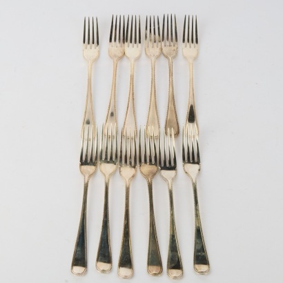 A Set of Twelve Sterling Silver Forks