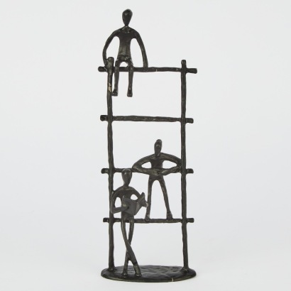 A Black Metal Tabletop Sculpture