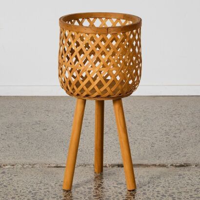 A Small Wicker Plant Stand