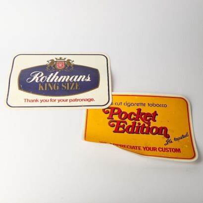 A Pair of Vintage Rothmans Countertop Mats