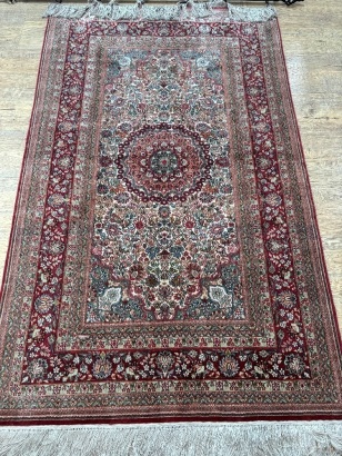 A Hand-Knotted Silk Kashmir Rug
