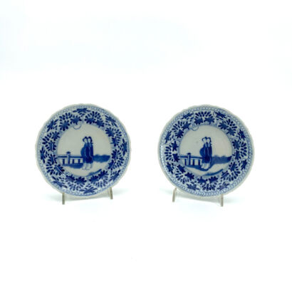 A Pair of Chinese Qing Dynasty Blue and White 'Figural' Saucers (one repaired)