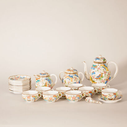 An Oriental Famille Rose 'Butterfly' Tea Set - 22 pieces