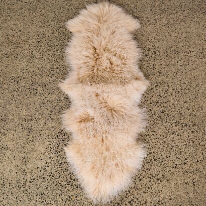 A Long Tibetan Lamb Hide Rug