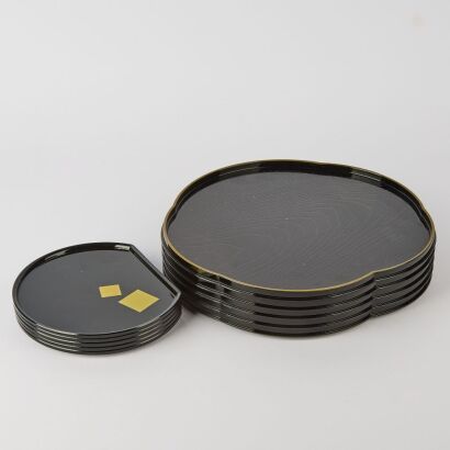 A Group of Ten Japanese Black Plastic Plates