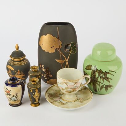 A Group of Eight Chinese and Japanese Small Porcelain Vases and Teacups and Saucers