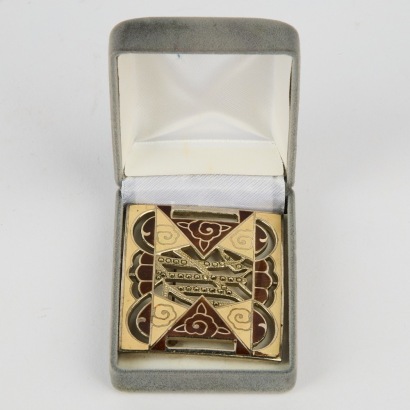 An Art Deco Enamel and Marcasite Brooch