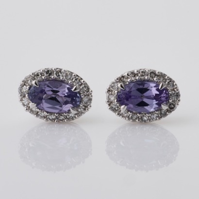 Michael Hill, 10ct White Gold, Oval Cut Tanzanite / 0.12ct Diamond Halo Stud Earrings