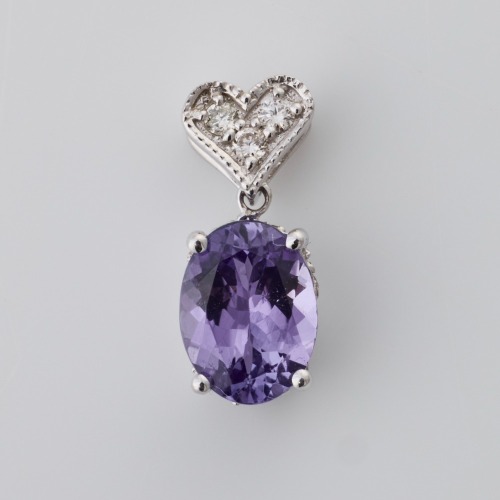 18ct White Gold, 1.00ct Oval Tanzanite / 0.09ct Diamond Pendant