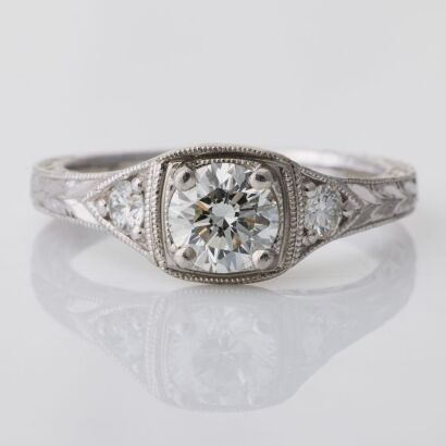 Platinum, Modern, 0.70ct Diamond / 0.12ct Diamond Solitaire Ring