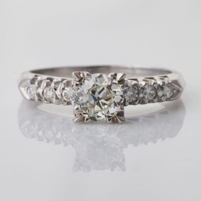 14ct White Gold, 0.60ct Diamond / 0.12ct Diamond Ring