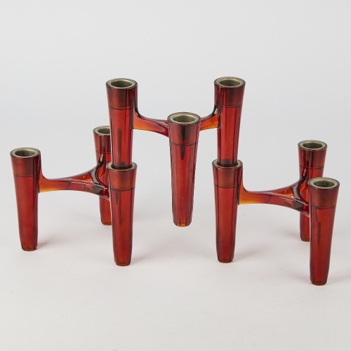 A Set of Three Hommage Koziol Candle Sticks