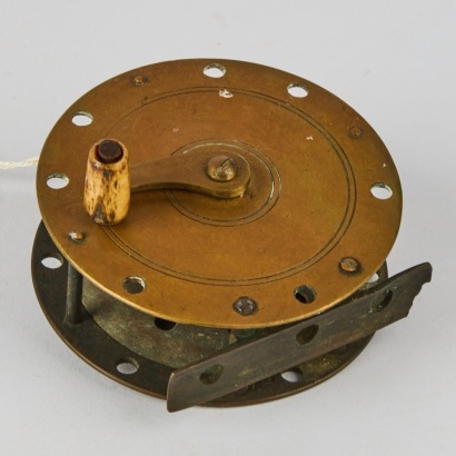 An Antique Brass Reel