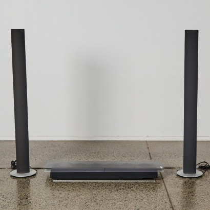 A Bang and Olufsen CD Player and Tower Speakers