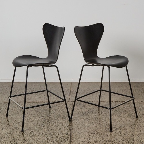 A Pair of Arne Jacobsen Series 7 Bar Stools