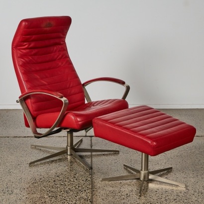 A BoConcept Red Leather Chair and Ottoman