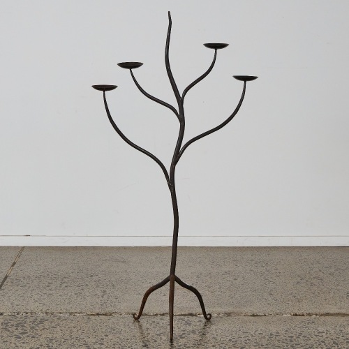 A Tall Wrought Iron Candelabra