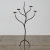 A Tall Wrought Iron Candelabra