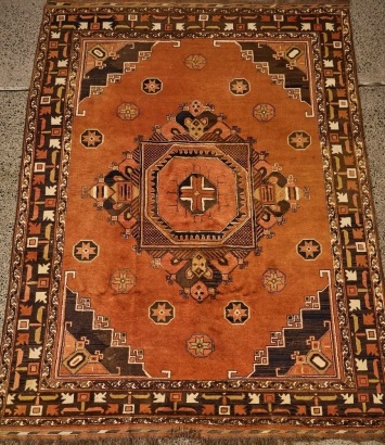 A Large Vintage Hand Knotted Persian Rug