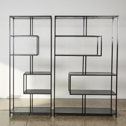 A Pair of Asymmetrical Shelving Units