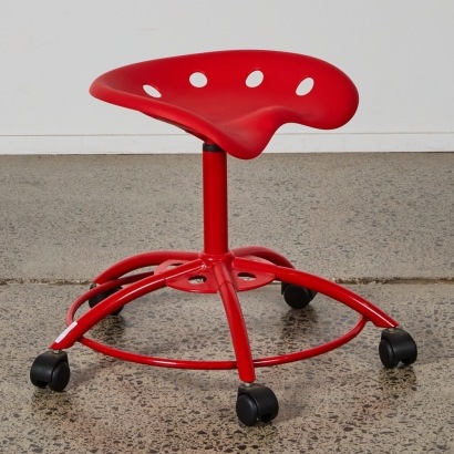 A Retro Style Tractor Seat Stool on Castors