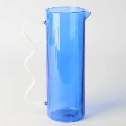 A Lumi Glass Minimalist Wave Pitcher in Blue and White