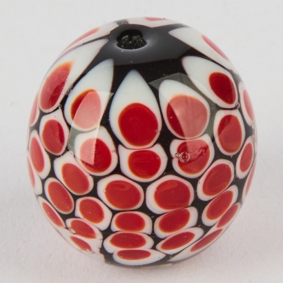 A Lisa West Millefiori Handblown Glass Bead in Red, Black and White