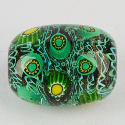 A Lisa West Millefiori Handblown Glass Bead in Green