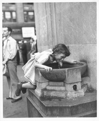 THE NEW YORK TIMES Hot Weather. Joyce Carlin, 5, seeks relief from today's hot spell at the water fountain in Bryant Park. 8/25/48