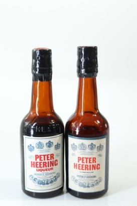 (1) Peter Heering Liqueur Miniatures, 2 Bottles Sold as One Lot