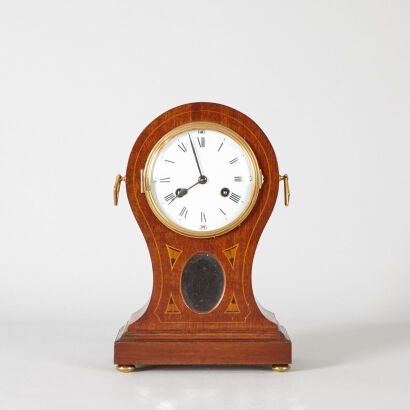 An Antique 'Balloon' Mahagony Mantle Clock