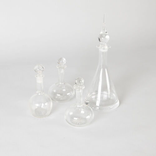 A Suite of Four Glass Decanters