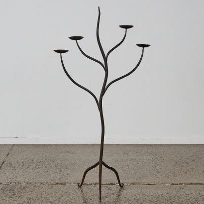 A Tall Wrought Iron Candelabra