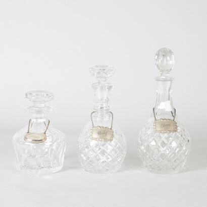 A Collection of Three Cut Crystal Decanters