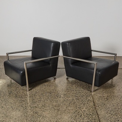 A Pair of Mid-Century Leather Occasional Chairs