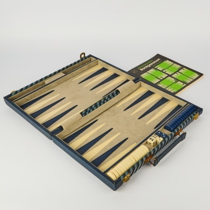 A Vintage Backgammon Set with Manual