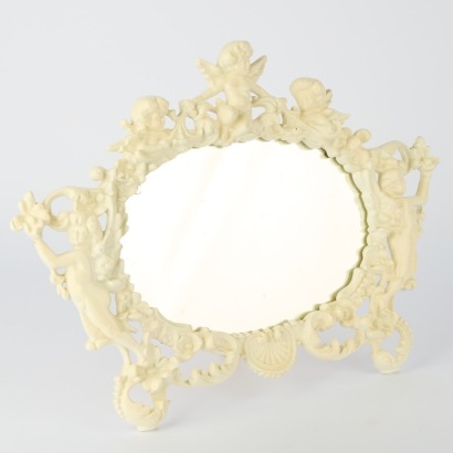 A Vintage Cast Iron Cherub Mirror