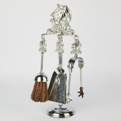 A Vintage Chrome Viking Ship Fireside Set