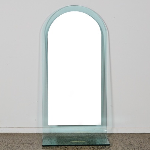 An Italian Wall Mounted Mirror and Glass Shelf