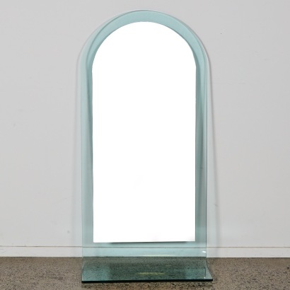 An Italian Wall Mounted Mirror and Glass Shelf