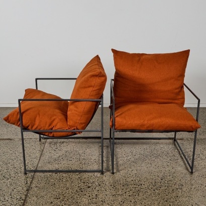 A Pair of Burnt Orange Lounge Chairs