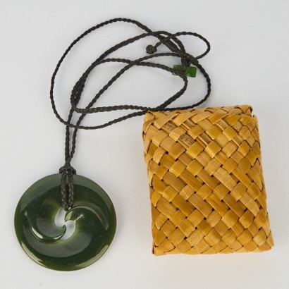 A Handcarved Pounamu Necklace and Kete