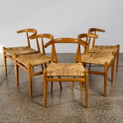 A Set of Five Hans Wegner Style Dining Chairs